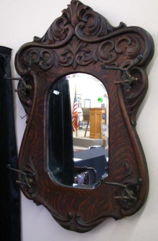 Golden Oak Era Wall Hat Rack / Mirror: Golden Oak era wall hat rack /mirror, with applied carvings, oak veneer, bevel edge mirror, with four hat/coat hooks