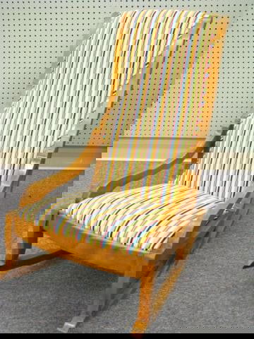 Antique Sewing Rocker: Antique sewing rocker, ash with elongated hip rests, contemporary stripe upholstered back and seat