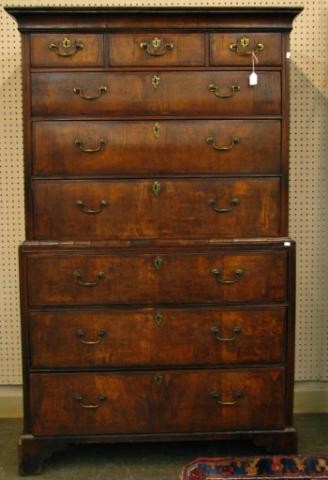 Antique 19th Century English Chest on Chest: Antique English chest on chest, circa second quarter 19th century, six over three drawers, hand formed brass escutcheons and pulls, solids and burl veneers, some minor imperfections on finish