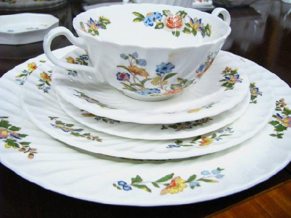 Set of Ainsley English Fine Bone China: Set of Ainsley English Fine Bone China, "Cottage Garden" pattern, floral and butterfly motif, service for eight, including demitasse set, tea set, serving bowls and lidded casseroles