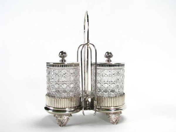 Wilcox Silver Co Double Pickle Caster Set: Wilcox Silver Co. Quadruple Plate Double pickle caster set with two pattern glass canisters, with two lids and two claw tongs