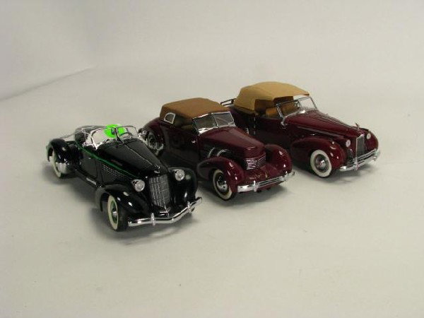Group of Three Franklin Mint Collector Models: Group of Three Franklin Mint Collector Models including 1940 Packard, 1937 Cord Phaeton Couple, and 1935 Auburn Speedster, in original shipping boxes