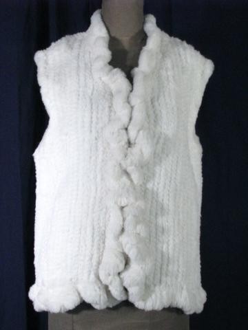 White Rabbit Knit Vest w/Ruffle down front: White Rabbit Knit Vest w/Ruffle down front , Size 10-12 , Length 26 , Retail Price $995 , Stock # 028627