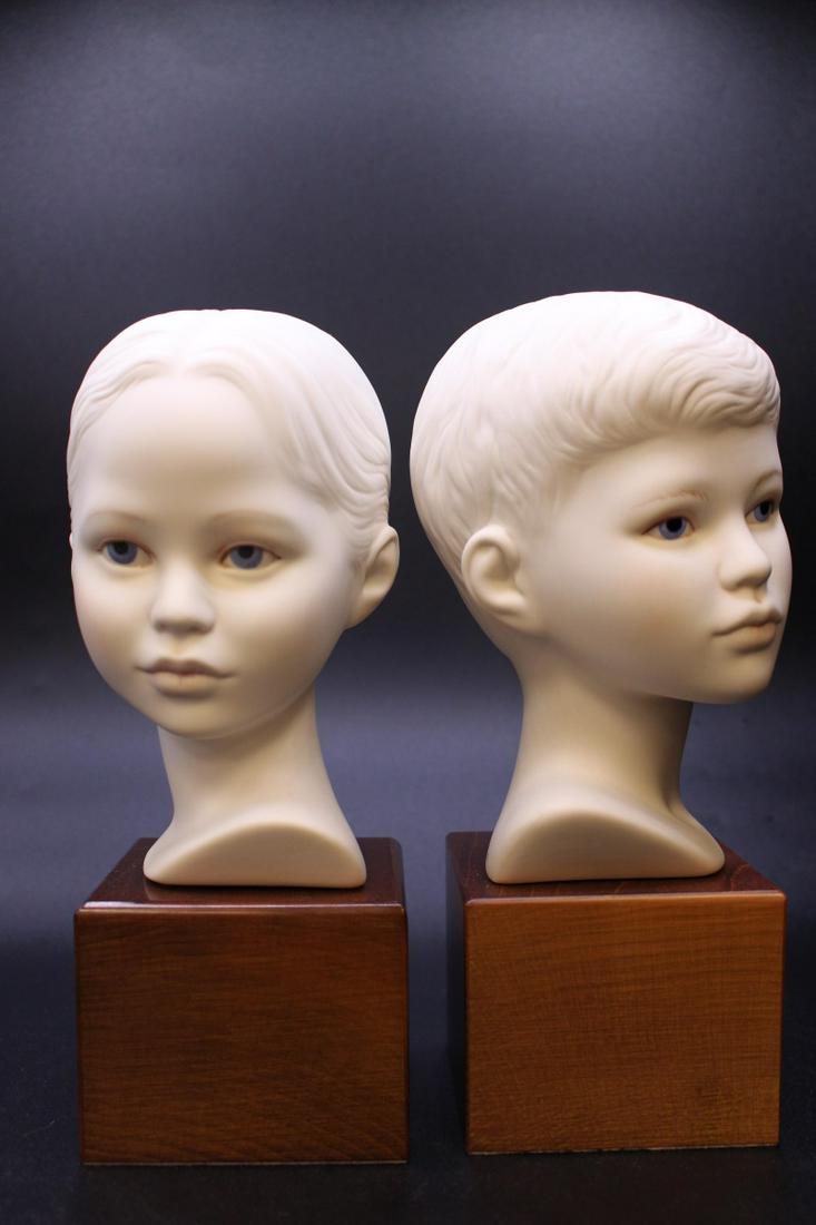 Cybis Head of Boy and Head of Girl: Cybis child portrait bust companions, "Head of Boy" and "Head of Girl", each 1963-1970, open editions, each approximately 9.75" tall and on matching bases. Signed with stamp used in 1950's. These mold
