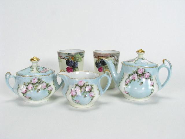 Bavarian Porcelain Tea Set, Two Tumblers: Bavarian porcelain tea set, teapot, sugar and creamer, and two hand-painted artist signed tumblers
