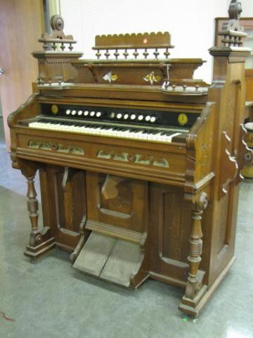 Ann Arbor Organ Co. Victorian Pump Organ: Ann Arbor Organ Co. Victorian Pump Organ, walnut Eastlake style finished and decorated on all sides, previously used in a church, weak bellows