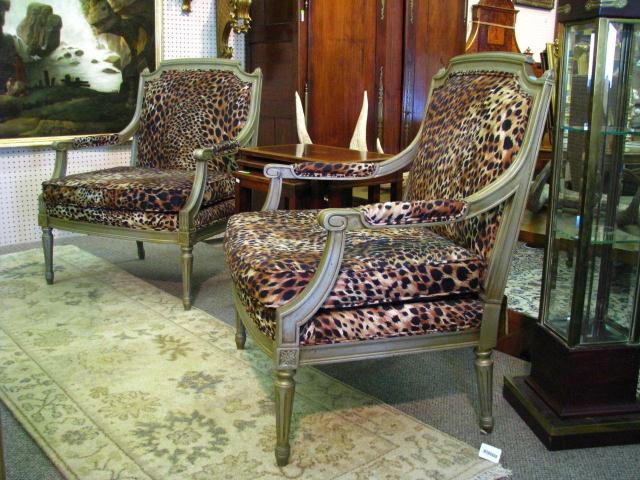 Pair of Custom Decorator Italian Provincial Chairs: Pair of custom Italian Provincial arm chairs, with ultra suede faux leopard upholstery, 36" high, approximately 25 inches deep, frames with painted antique gold finish