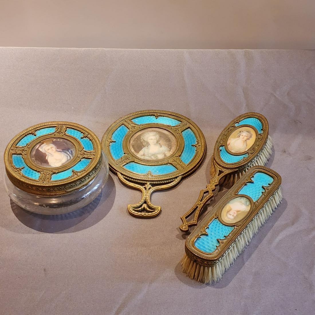 Antique French Dresser Set: Antique French dresser set, all with portrait medallions, includes powder box, 6"dia, hand mirror, 9"l, hair brush, 9.5"l, and a clothes brush, 7.5"l