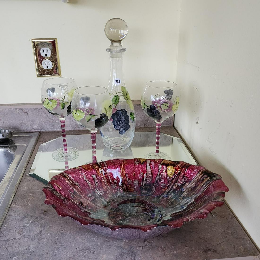 Large Lot of Barware: Including a contemporary 15" tall decanter and three wine glasses in grape motif; an Il Quadrifoglio bowl, 14" x 9.5"; a mirrored beveled edge tray, 12" x 18"; seven contemporary stemmed water glasses