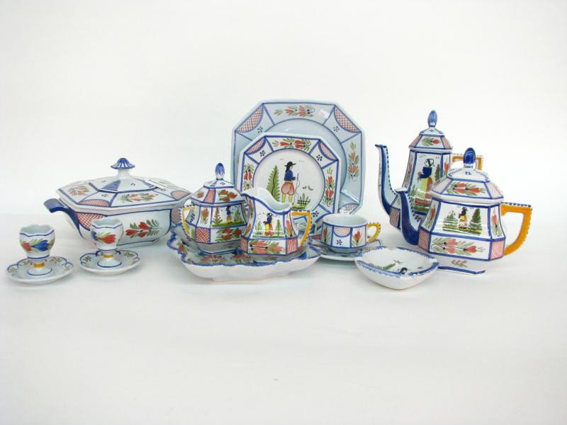 Set of Quimper Dinnerware: Set of Quimper Dinnerware, service for eight including tea and coffee service, other serving pieces, a few items have chips, this is a contemporary set