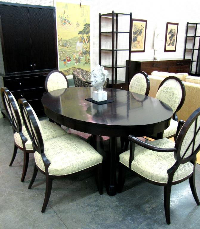 Baker Dining Room Suite by Barbara Barry: Baker Dining Room Suite by Barbara Barry, including oval dining table, 48 x 68 x 30" high, one 20" leaf, Java finish, six oval backed chairs including two host chairs (back of one of the side chairs n