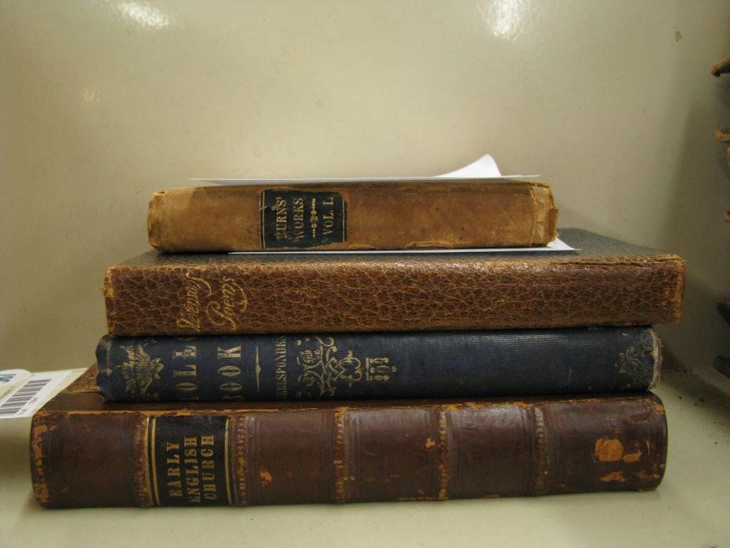 Four Antique Books: Four antique books including "The Poetical Works of Robert Burns Including Several Pieces Not Inserted in Dr. Currie's Edition; Exhibited Under a New Plan of Arrangement, and Preceded by Life of the A