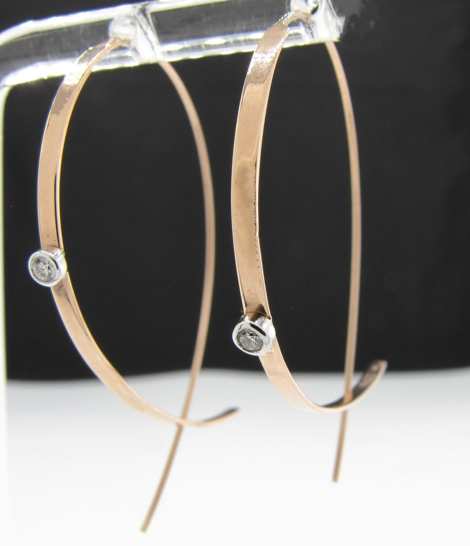 Lana 14K Rose Gold Diamond Upside Down Earrings: A pair of Lana Jewelry 14K rose gold thread through upside down earrings with a minimalist single bezel set diamond accent on each earring. Flat front design. Approximately 1.125" wide and 1.63" drop