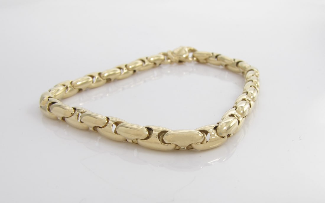 18K Yellow Gold Chimento of Italy Solid Link Chain: An 18K yellow gold 7" long round solid link chain, 5mm diameter links, by Chimento of Italy. 9dwt. Retail $2,500