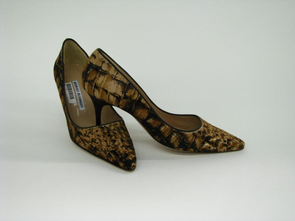 Manolo Blahnik Pointed Toe Pump: Manolo Blahnik pony hair reptile print pointed toe pump. Heel 3 1/2", size 39