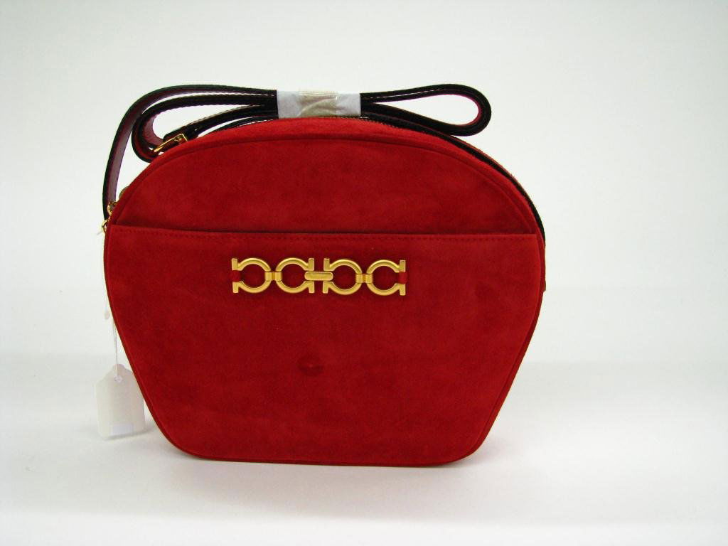 Salvatore Ferragamo Red Suite Shoulder Bag: Salvatore Ferragamo red suede cross body shoulder bag with original dust bag; 7 1/4" x 9" x 2 1/4"