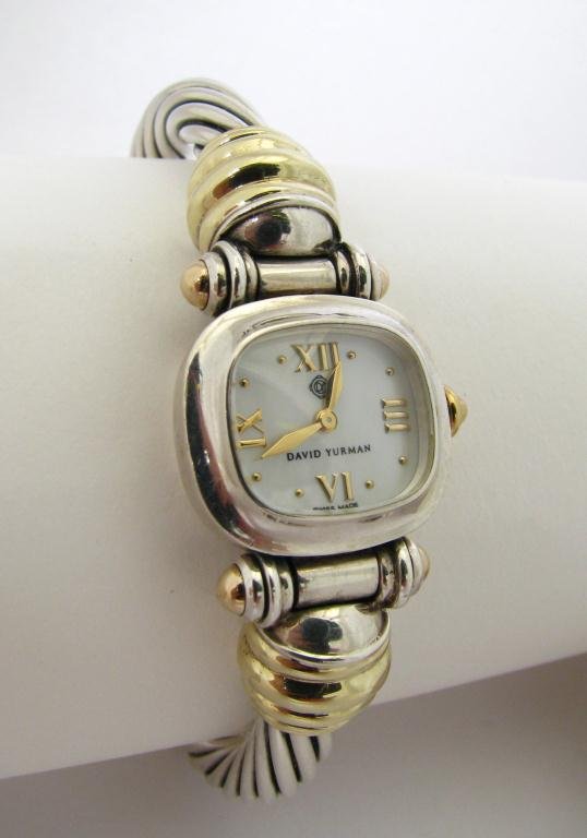 David Yurman Sterling, 18K YG Lady's Watch: David Yurman sterling and 18K yellow gold lady's cable bangle watch