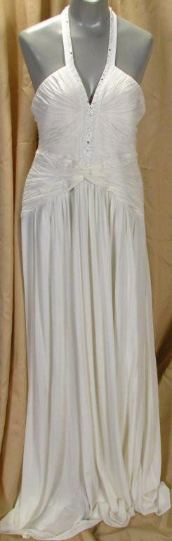 BCBG Maz Azria Halter Top Gown: BCBG Maz Azria cream color ruched bodice halter top gown with beaded detailing at chest. Zip back closure. Size L