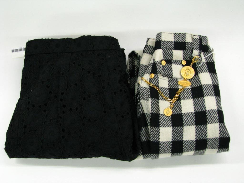 Two Pair of Designer Pants, Versace, Oldham: Lot of two pairs of designer pants: 1. Versus by Gianni Versace black and white check wool five pocket style with zip front, ankle zippers and removable lion head pocket chain size 28/42 and 2. Todd O