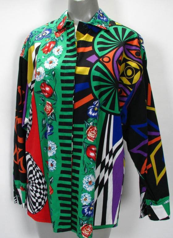 Three Gianni Versace Blouses: Lot of three Gianni Versace blouses: 1. Versus multi-color stripe silk/acetate button front blouse --size 30/44 Model Capo 128449/V Col 520--Retail Versus San Fran $415, 2. Versace Jeans Couture clown