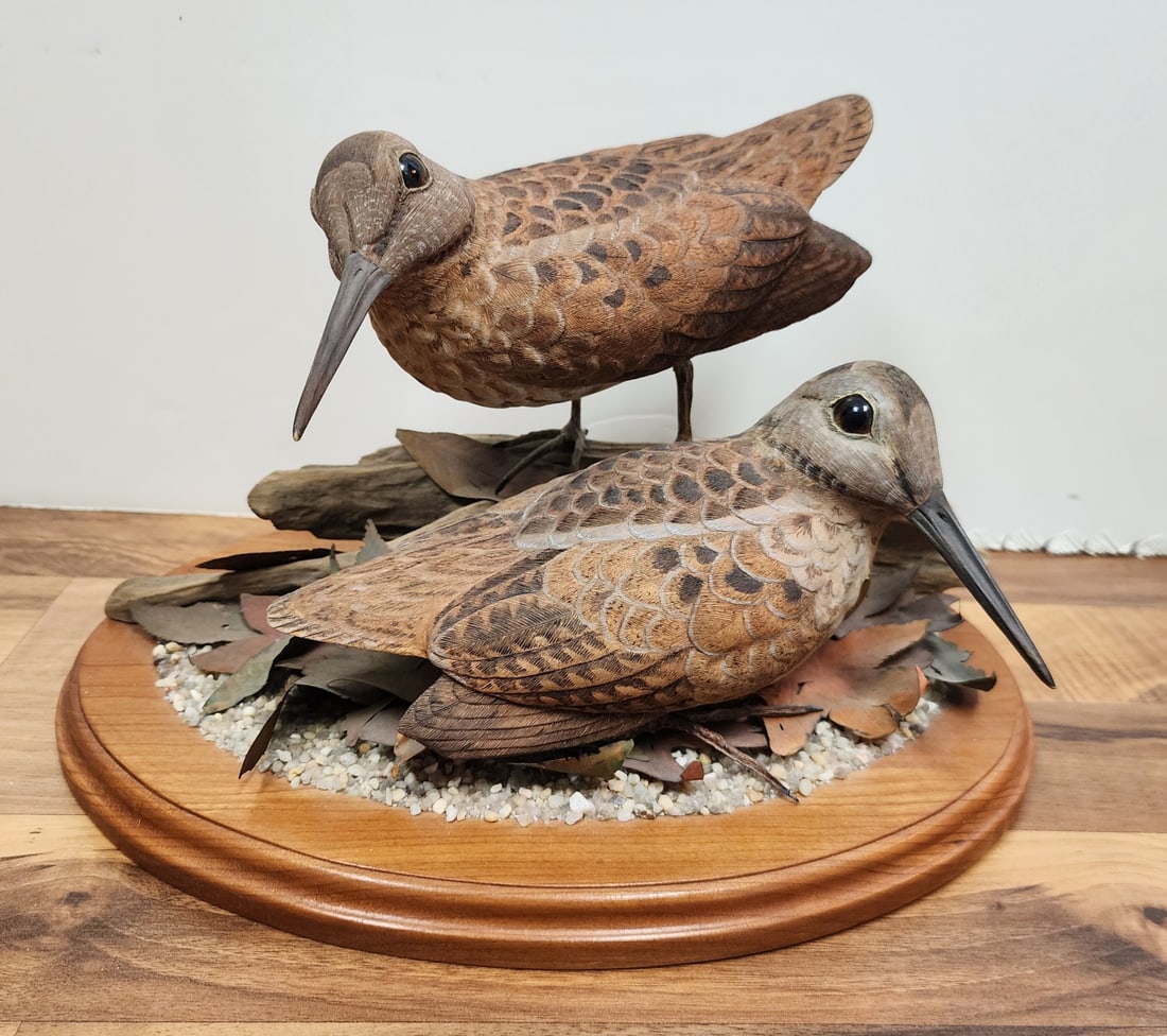 Ray Schill,"Woodcocks", Wood Carved Sculpture: Ray Schill, (VA, Active), hand painted and carved wood, "Woodcock", incised signature, title and dated 11-28-89 on bottom of base. Depicting two nesting woodcocks, one standing with carved legs, both