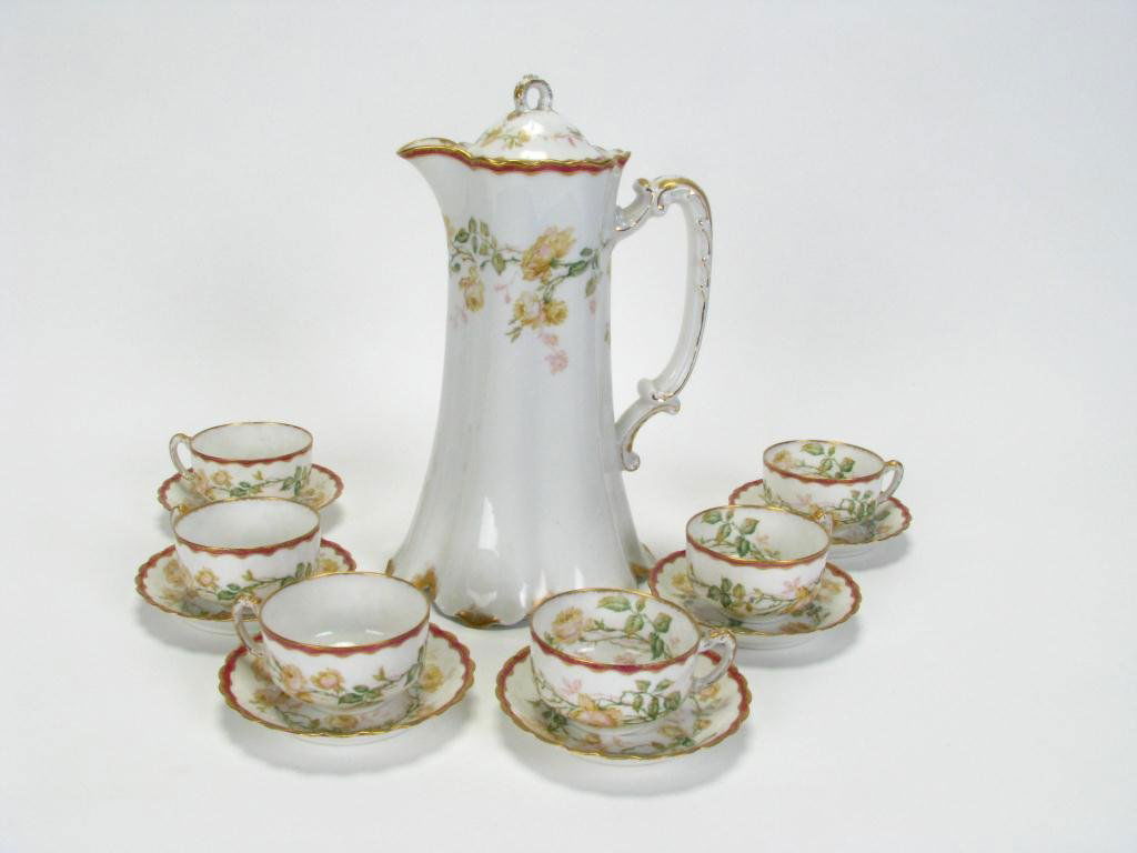 Haviland Limoges Antique Porcelain Chocolate Set: Haviland Limoges Antique Porcelain Chocolate Set including a 10.5" lidded pot, and set of six each matching cups and saucers