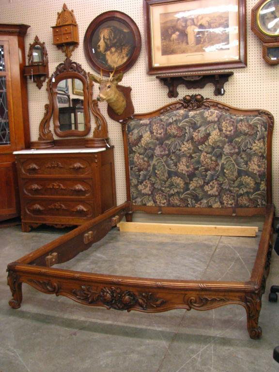 Heavily Carved French Bed, Upholstered Headboard: Heavily Carved Ornate French Bed with deep rose carved side rails, Floral and leaf headboard with tapestry Upholstery, full size