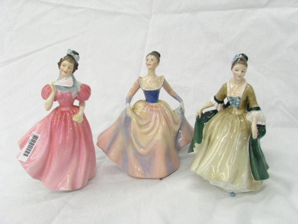 Three Royal Doulton Porcelain Figures: Three Royal Doulton Porcelain Figures including "Camellia", "Lisa", and "Elegance"