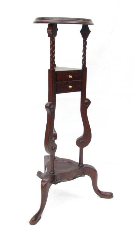 Period Style Mahogany Candle Stand: A period style mahogany candle stand, circa late 20th century