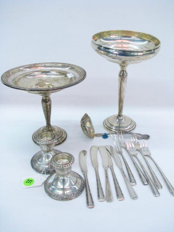 Group of Sterling Silver Table Accessories: Group of sterling silver table accessories including five cocktail forks, a ladle, five butter knives and weighted sterling including pair of candle sticks and two open compotes