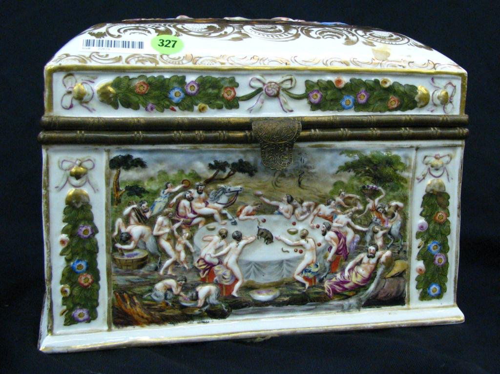 Capodimonte Hinged Lid Box: A Capodimonte hinged lid box with nude and pagan scenic depictions on sides and top, blue cross arrows mark, 8" high x 8.5" x 10", circa mid 20th century