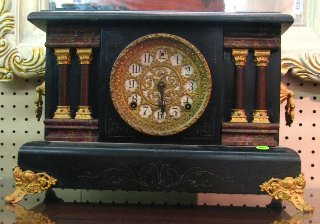 Antique Sessions Mantle Clock: Antique Sessions Mantle Clock, ebonized wood case with gilded cast metal mounts and Corinthian column design