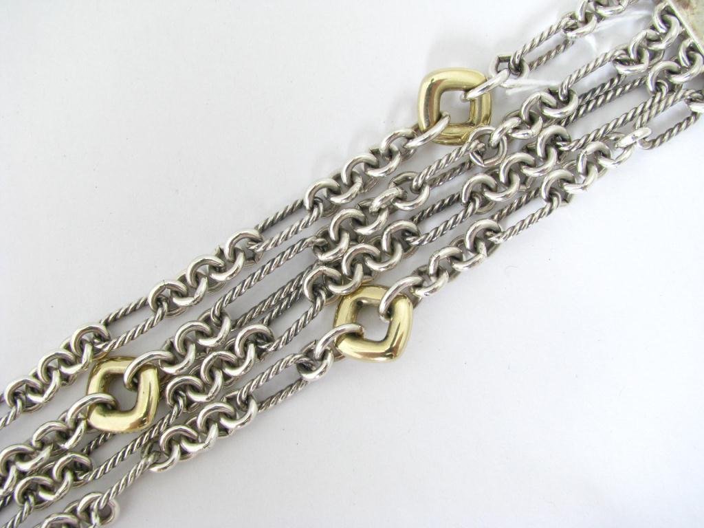 David Yurman Sterling and 18K Link Bracelet: A David Yurman Sterling and 18K Four Row Link Bracelet with fold over clasp