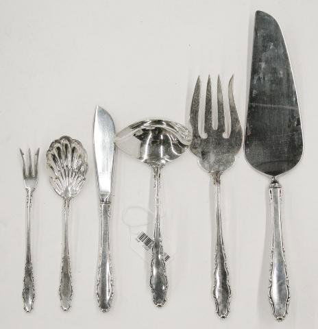 English Provincial Reed & Barton Serving Pieces: A group of Reed and Barton sterling silver, serving flatware, in English Provincial pattern, including sauce ladle, olive fork, cake server, shell spoon, butter/cheese knife and meat fork, six items