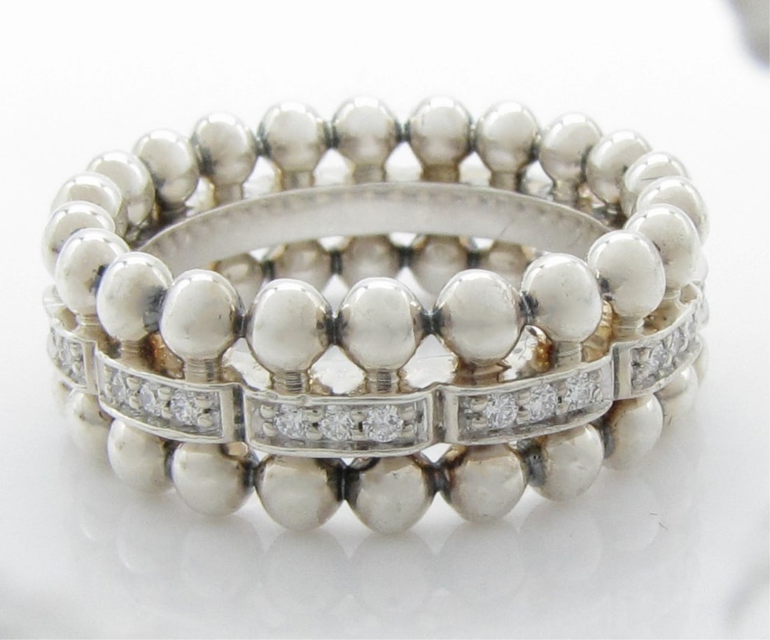 Stephen Lagos Caviar Spark Diamond Band: A Stephen Lagos sterling silver Spark beaded eternity band ring featuring .26ctw of round white diamonds. Ring is 8mm wide. Size 7. Retail $1450