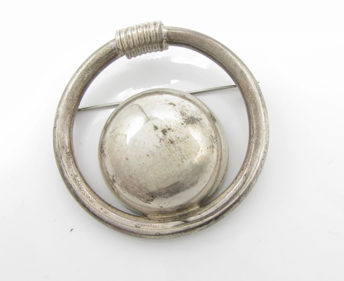 Two Items, SW Style Silver Jewelry: Two items, SW style silver jewelry, including panel-link bracelet with amethyst-color buttons on scenic links, 6.5"l, selling with a round lapel pin, marked .925 Mexico, 401.dwt total