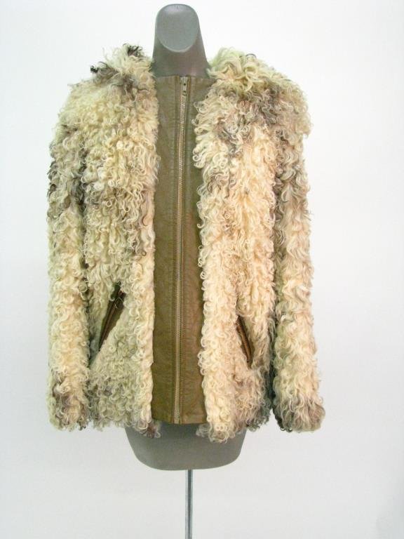 Anger Furl Salon Curly Lamb Hooded Jacket: Anger Furl Salon Creations by Mr. Michael New York curly lamb hooded jacket. The bomber style jacket features brown leather trim around the zip front and the two zip slant pockets. Coat is lined in br