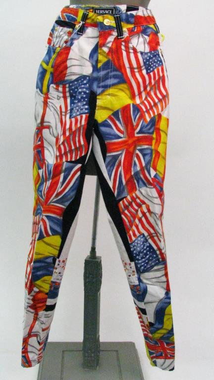 Versace Jeans Couture, Flag Print: Versace Jeans Couture rare vintage flag print five pocket jeans with sunburst studs and buttons; Size 27 (US 2)