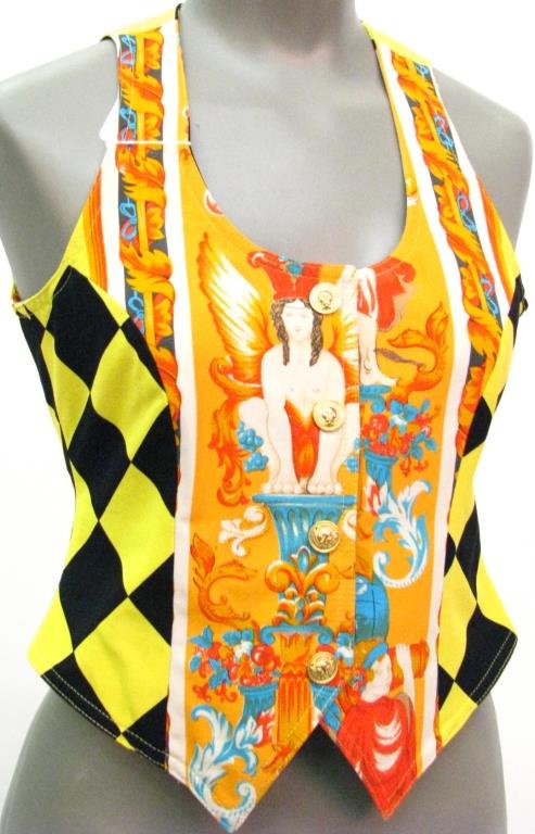 Versus by Gianni Versace Harlequin Pattern Vest: Versus by Gianni Versace vintage black and yellow harlequin pattern vest with figural and gargoyle baroque style design on front. Five lion head snap closure down front; Size 24 (US XS)