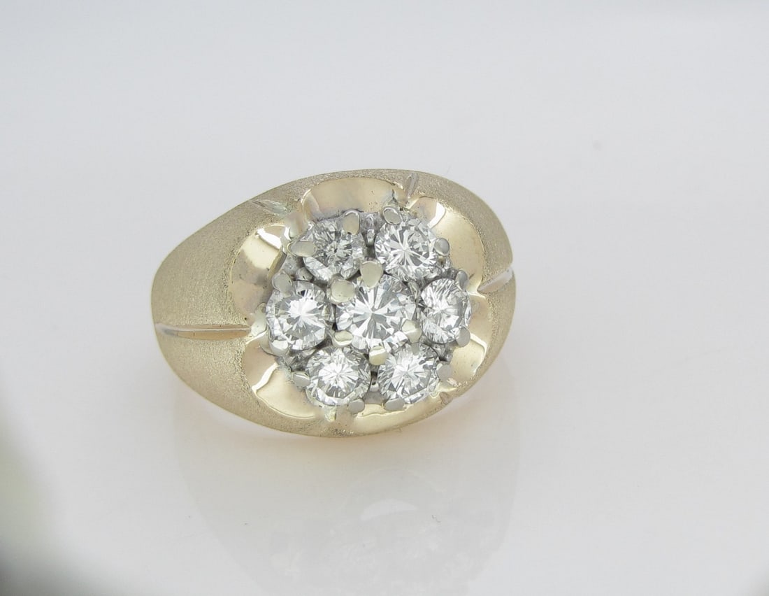 14K Yellow Gold Gent's Diamond Ring: A 14K yellow gold, 12mm wide, gentleman's ring featuring five channel set, approximately .20ct round brilliant cut diamonds, approximately 1.00ctw. Diamonds are of SI2 to I1 clarity and H-I color.