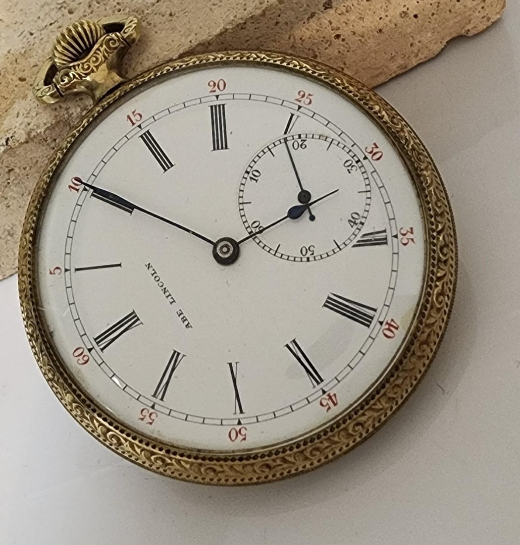 Electa?? Abe Lincoln Pocket Watch: An unidentified/misidentified Swiss movement pocket watch that has been quite a topic of conversation this month with watch collectors and experts from around the world. This watch has many
