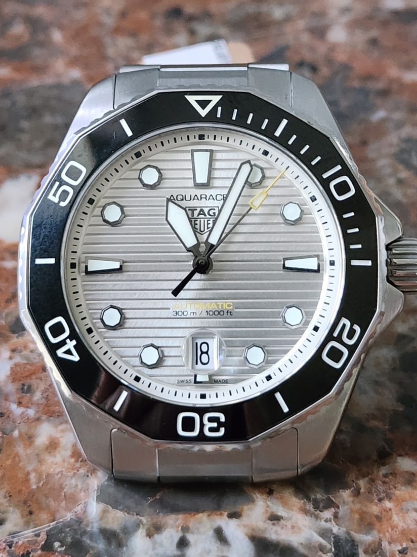 Tag Heuer Aquaracer Professional 300: A Tag Heuer Aquaracer Professional 300 watch, #WBP2016, 2021, stainless steel, black bezel, silver dial, large luminous hands and dot and stick markers, date at 6 o'clock, black ceramic