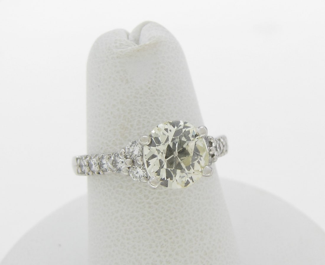 Scott Kay Platinum Diamond Ring, 1.70CTW: A Scott Kay platinum ring with Old European, round, brilliant cut center diamond weighing 1.46ct of N-O color, VS clarity, mounting also contains twelve .02ct diamonds weighing .25ctw of VS clarity