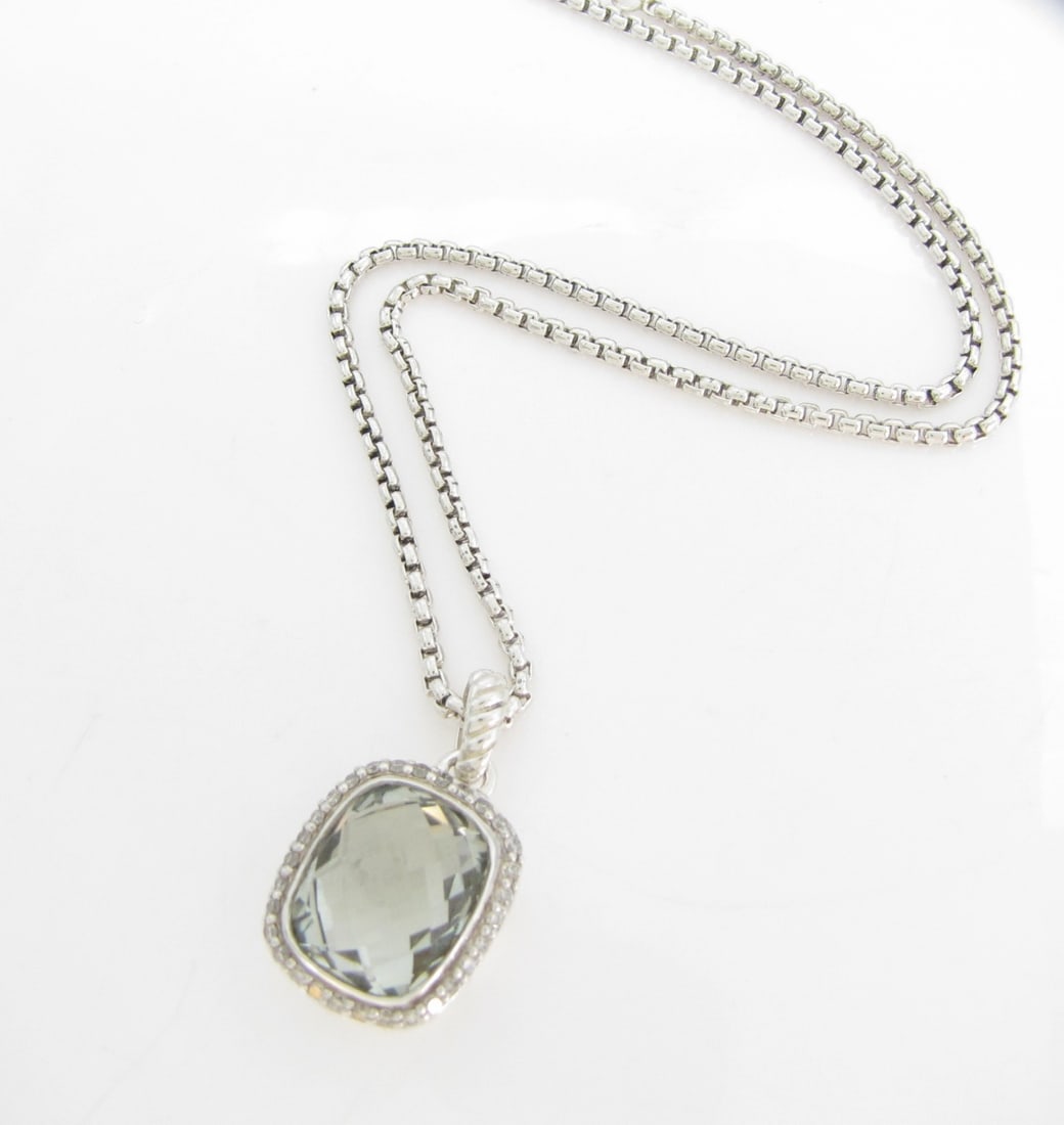 David Yurman Prasiolite, Diamond Albion Pendant: A David Yurman elongated Albion pendant with prasiolite in a diamond halo, on a 17" box chain. Pendant approximately .90" x .53". Retail $1,400