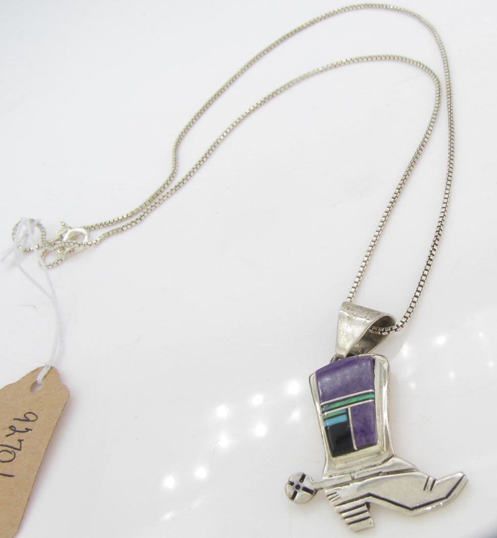 Cecil Ashley Sterling Multi-Stone Boot Pendant: A Cecil Ashley (Navajo) sterling silver boot pendant featuring inlaid onyx, turquoise, purple sugilite and opal. Pendant measures approximately 1.5" x 1" and comes with a sterling silver Italian, 18"