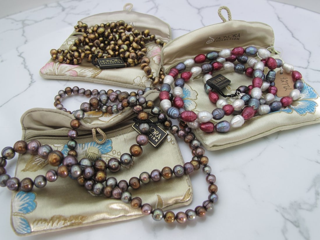 Three Honora Dyed Freshwater Pearl Necklaces: Three Honora dyed freshwater pearl necklaces including a bronze dyed rope strand with .925 lobster clasp, with Honora zippered bag; a multiple color rich hued baroque shaped freshwater pearl opera len