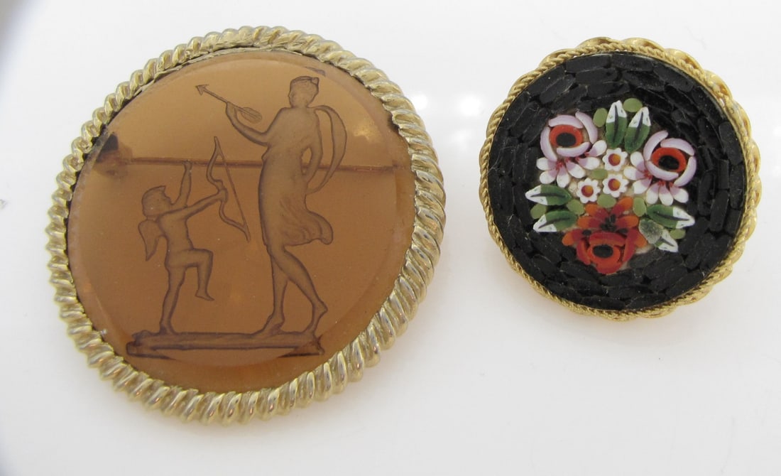 Two Vintage Brooches: Two vintage brooches, including etched intaglio brooch, depicting Venus and Cupid, with twisted rope cable design frame- possibly Goldette, NY- and a micro-mosaic floral design brooch, marked Italy, i