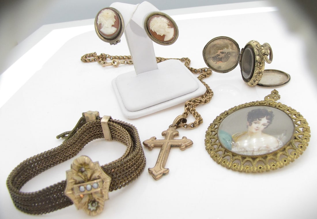 Group of Antique, Vintage Gold-Filled Jewelry: Group of antique and vintage gold-filled jewelry, including pendant with hand-painted, signed, portrait, 1.875" dia, and an Orthodox cross pendant on chain, double-sided gold-filled locket, a