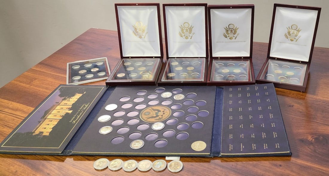 Group of Gold Presidential $1, plus displays: Group of Gold Presidential $1, plus displays, (27) count $1 coins, plus 4 hinged wood displays, and one folio display (all are incomplete)