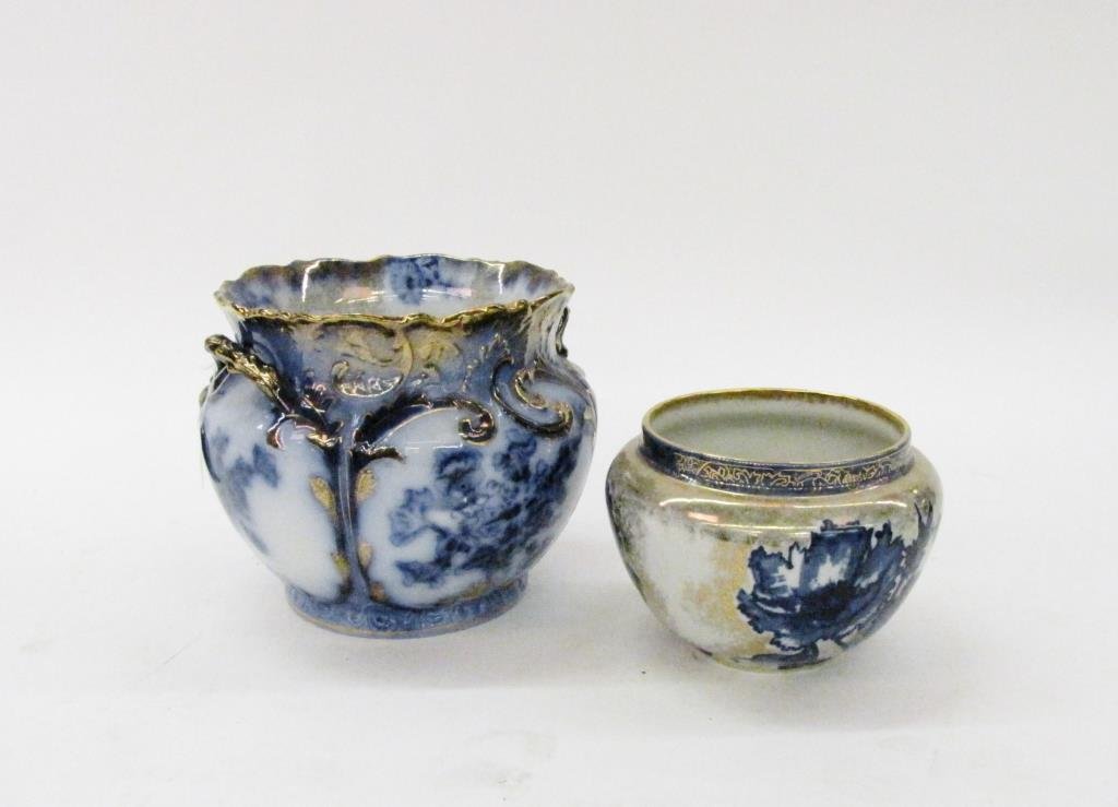 Group of Flow Blue Iron Stone: A group of Flow Blue iron stone, including cuspidor, 12" planter, 7" planter, and deep bowl